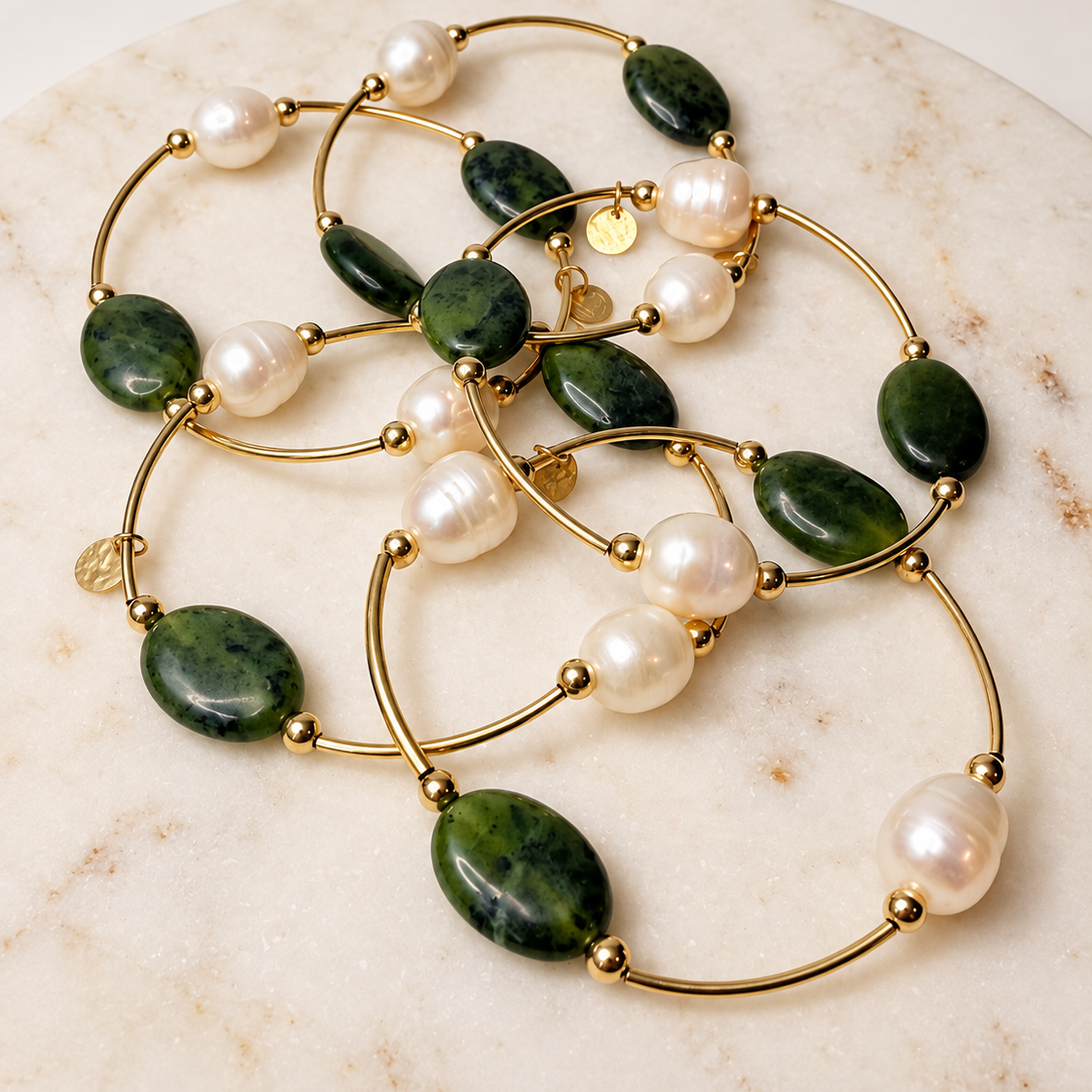 Multiple Canadian green jade and freshwater pearl gold-filled bracelets by Gypsy & Gem