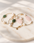 All three freshwater pearl bracelets in the collection including all pearl, pearl with canadian green jade and pearl with rose quartz